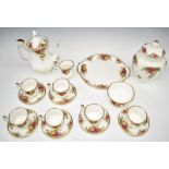 Approximately sixteen pieces of Royal Albert Old Country Roses tea ware including teapot and vase,