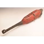 African tribal mask with red painted and carved decoration, 76cm long.