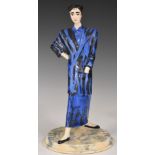 Dennis Chinaworks signed figurine from the 1980s Fashion Figurines series in blue and black