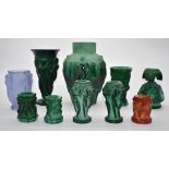 A collection of jade malachite style pressed glass including Czech putti/cherub vase designed by