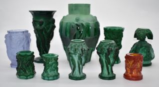 A collection of jade malachite style pressed glass including Czech putti/cherub vase designed by