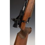 Anschutz model Match 54 .22 bolt-action target rifle with textured grip, raised cheek piece,