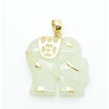 A 9ct gold pendant set with a jadeite elephant