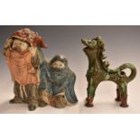 Chinese 19th/ 20thC carved wooden figure of two boys in a dragon costume, together with a Chinese