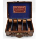 Army & Navy leather and brass bound shotgun cartridge carry case with 'Army & Navy CSL Gun
