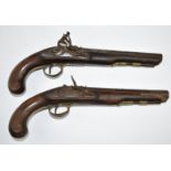 A pair of John Probin flintlock dueling pistols with locks engraved 'J Probin' engraved brass