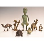Five African bronze tribal figures together with a carved wooden miniature mask and a pottery