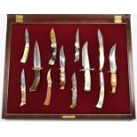 Twelve Franklin Mint knives 'The Sportingman's Year Hunting and Fishing Collection' including Canada