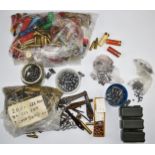 A large collection of shotgun cartridge and brass rifle cartridge cases suitable for re-loading,