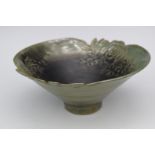 Studio pottery bowl with relief decoration of flowers, indistinct mark to base, diameter 20cm x