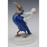 Rosenthal porcelain figure of girl riding a toucan impressed H41 mark to base, H24cm