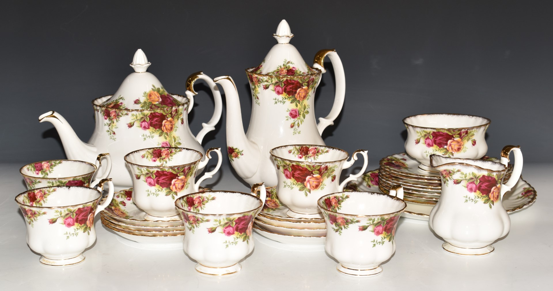 Approximately twenty two pieces of Royal Albert Old Country Roses teaware including two teapots,