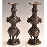 Pair of Japanese bronze candlesticks, 21cm tall.