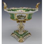 A 19thC Davenport twin handled centrepiece with scrolling support and triform base decorated with