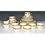 Thirty eight pieces of Minton dinner and teaware decorated in the Buckingham pattern, six place