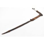 Tribal wire bound and bone handled carved wooden walking or king stick, 85cm long.