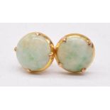 A pair of 18ct gold earrings set with jade cabochons
