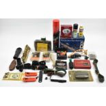 A collection of gun and shooting accessories including Deben Tracer Mini gun light, cleaning kit,