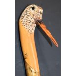 Ian James carved and painted wooden walking stick with handle in the form of a woodcock, L133cm