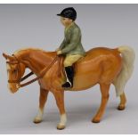 Beswick boy on a Palomino pony, H14cm