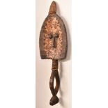 African carved tribal mask with copper face, probably Ashanti, 49cm long.