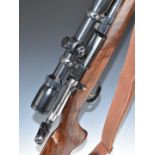 CZ 550 6.5x55 bolt-action rifle with chequered semi-pistol grip and forend, raised cheek piece,