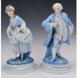 A pair of Continental figures, he holding a hat and she with a prayer book, H34.6cm