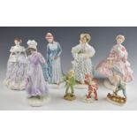 Eight Royal Worcester figurines including a set of four Walking Out Dresses, tallest 26cm