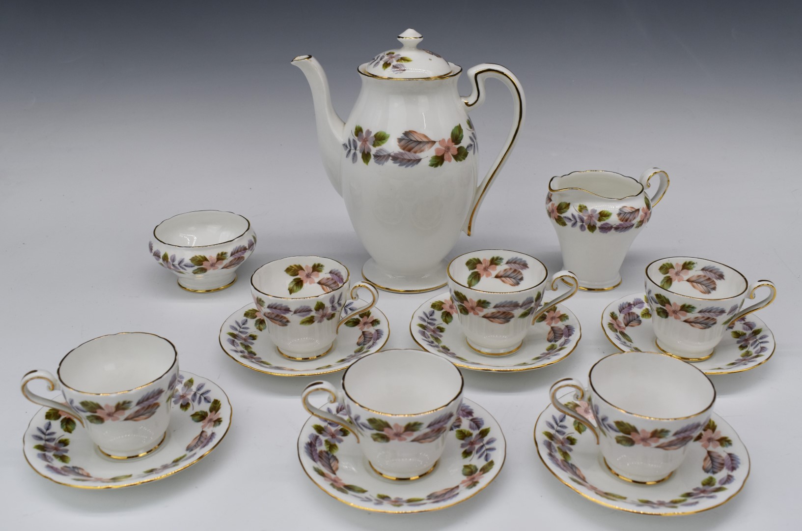 Fourteen pieces of Aynsley teaware decorated in the April Rose pattern