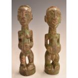 A pair of African bronze tribal fertility figures, 18cm tall.