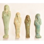 Four Ancient Egyptian shabti, largest 13.5cm tall.