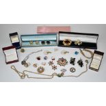 A collection of early Sarah Coventry jewellery including brooches, rings and earrings, some marked