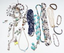 A collection of jewellery including silver necklaces, pearl necklaces, silver rings, silver