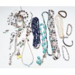 A collection of jewellery including silver necklaces, pearl necklaces, silver rings, silver