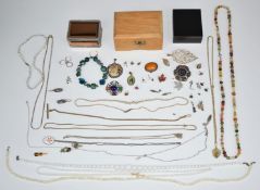 A collection of jewellery including silver brooch, silver earrings, beads, 9ct gold ring, 9ct gold