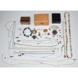 A collection of jewellery including silver brooch, silver earrings, beads, 9ct gold ring, 9ct gold