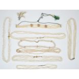 Eight freshwater pearl necklaces and a pearl brooch