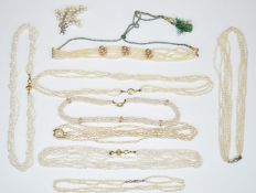 Eight freshwater pearl necklaces and a pearl brooch