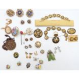 A collection of jewellery including Toledo, Sphinx brooch, Art Deco beetle brooch, etc