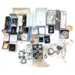 A collection of costume jewellery including Miracle brooch, Trifari brooch, silver ring set with