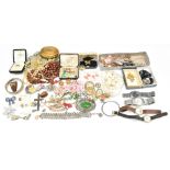 A collection of costume jewellery including silver Mikimoto ring in original box, filigree brooch,