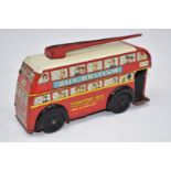 Brimtoy tinplate friction powered trolley bus with 'Buy British Transport Bus Made in England