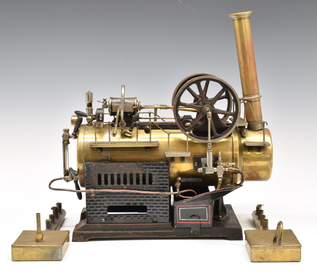 Doll model 520 overtype live steam engine with single cylinder, with twin fly wheels, lever safety