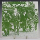 Sarah - The Poppyheads - Cremation Town (SARAH 6). Record appears EX, cover VG, poster with four pin