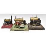Three stationary live steam engines comprising a Fleischmann with oscillating cylinder and governor,