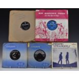 A collection of singles and 78s including Rock n Roll
