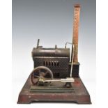 Doll stationary live steam engine with oscillating cylinder, sight glass, central safety valve and