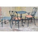 Metal garden table, two chairs and a side table