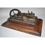 19thC live steam single cylinder mill engine with flyball governor, on wooden base, L48cm