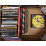 A collection of CDs including box sets, mostly U2 and Faith No More